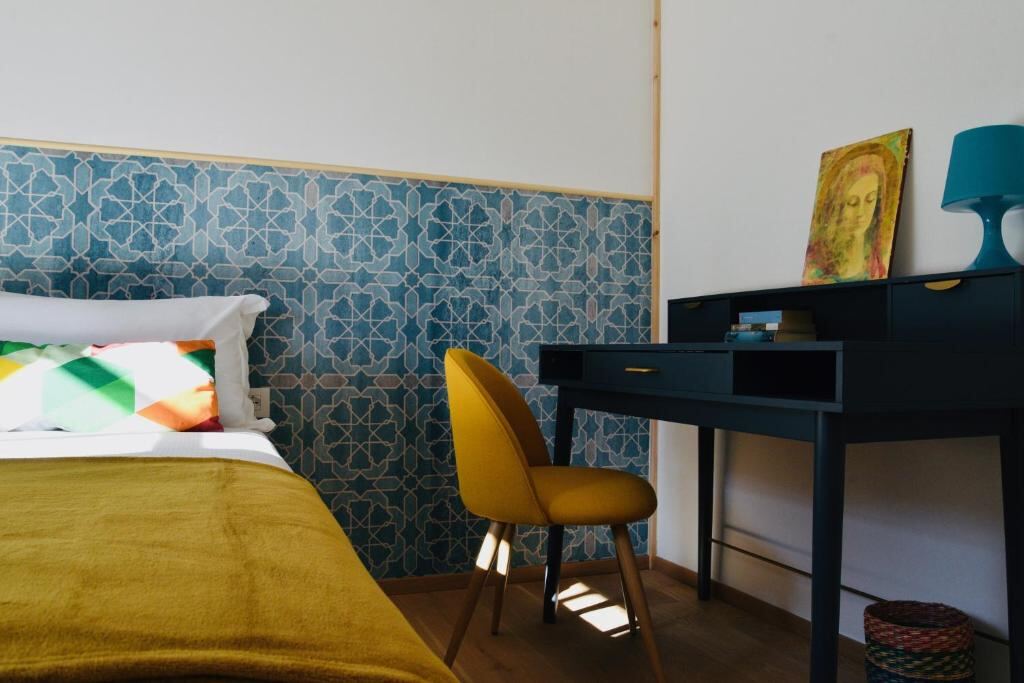Camera del Nine Rooms Suite a Trento